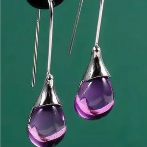 Silvery with purple gemstone dangle earrings